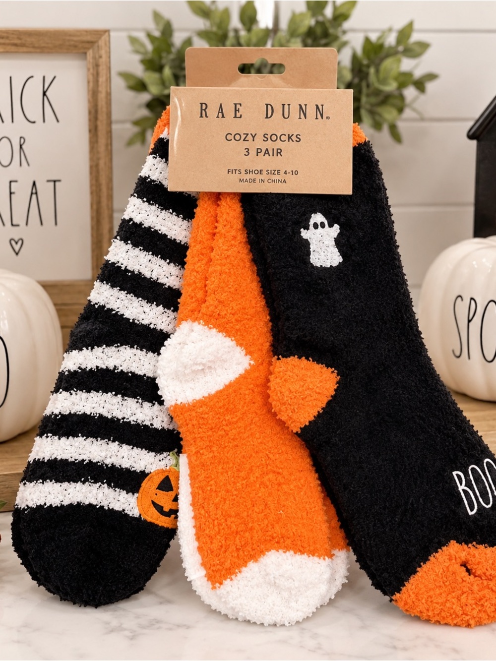 NWT Rae Dunn 3 Pack Cozy Halloween-themed fuzzy socks in black, orange, and whit